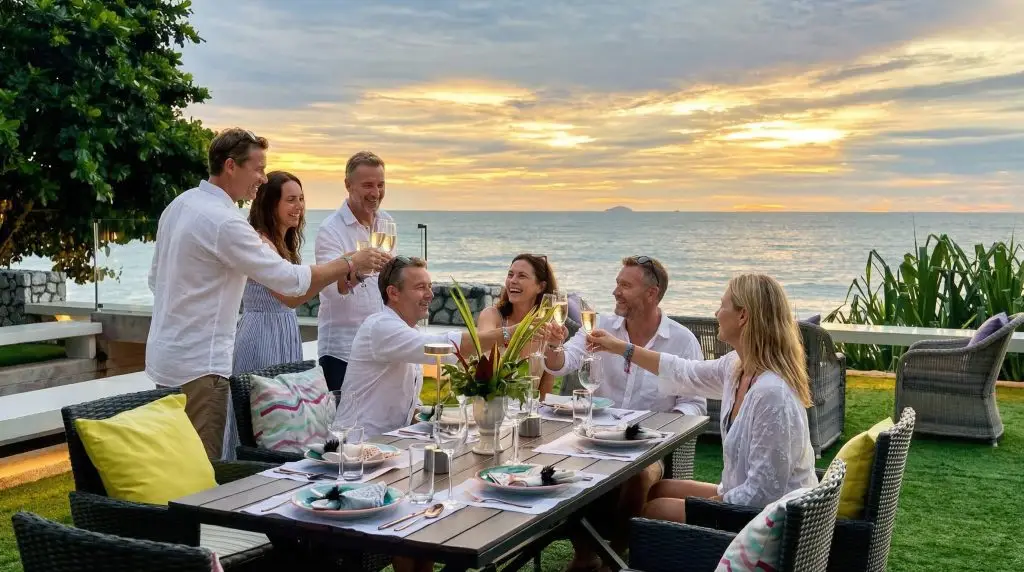Friends celebrating Tomorrowland Thailand 2026 beachfront villa sunset Natural Luxury Villas